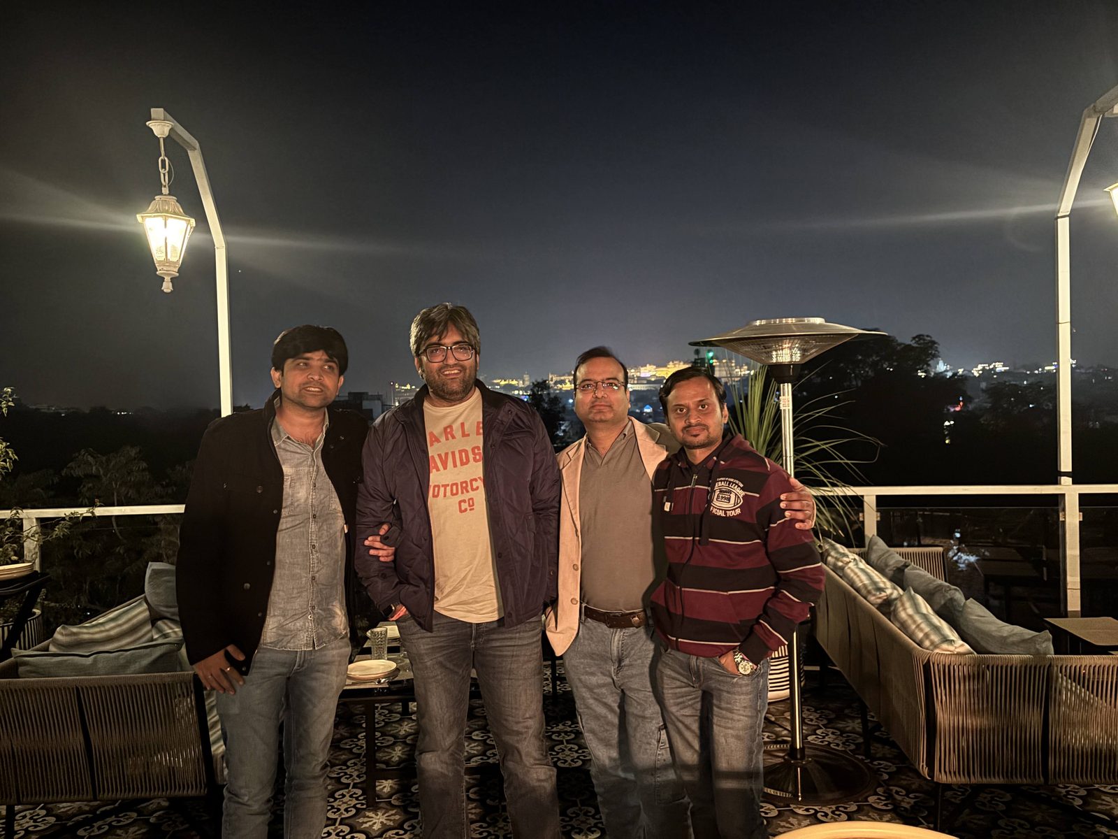 Sandeep Jain with friends at an evening rooftop gathering